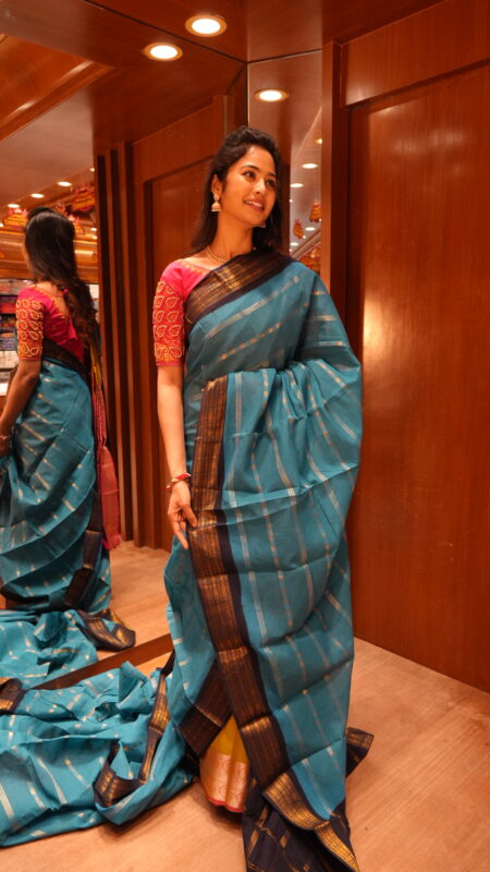 Serene Teal Checks Saree with Rich Navy and Gold Zari Borders