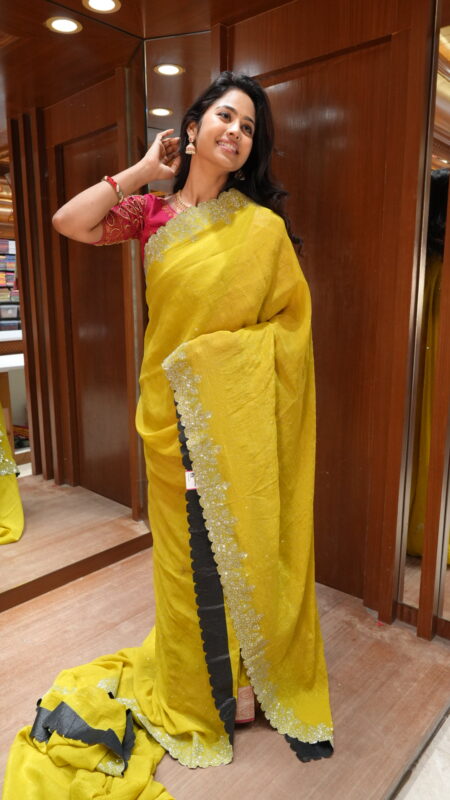 Festive Radiance: Lime Yellow Silk Saree with Scalloped Border